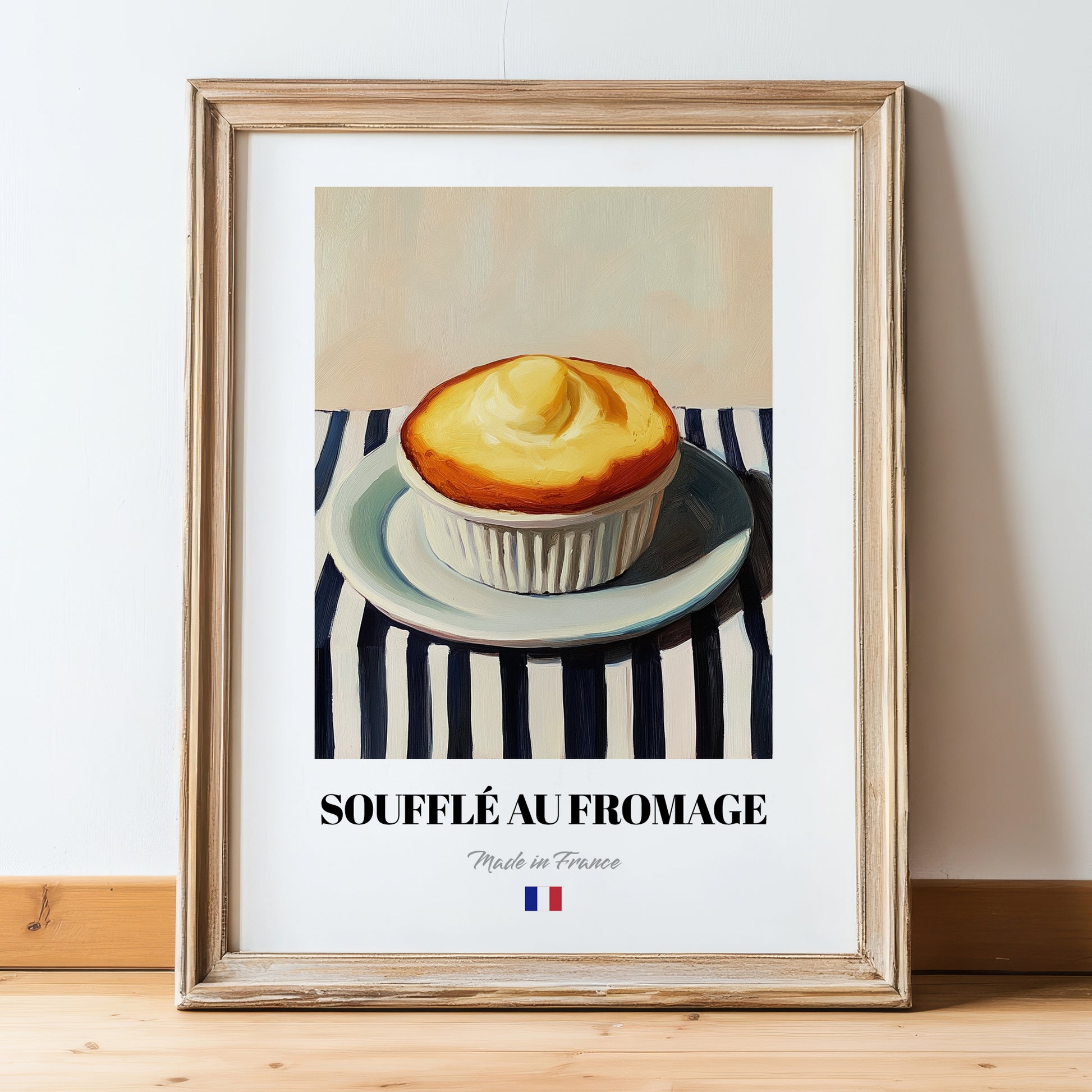 Soufflé au Fromage – on Striped Tablecloth, French Food Wall Print, in wooden frame leaning on the floor
