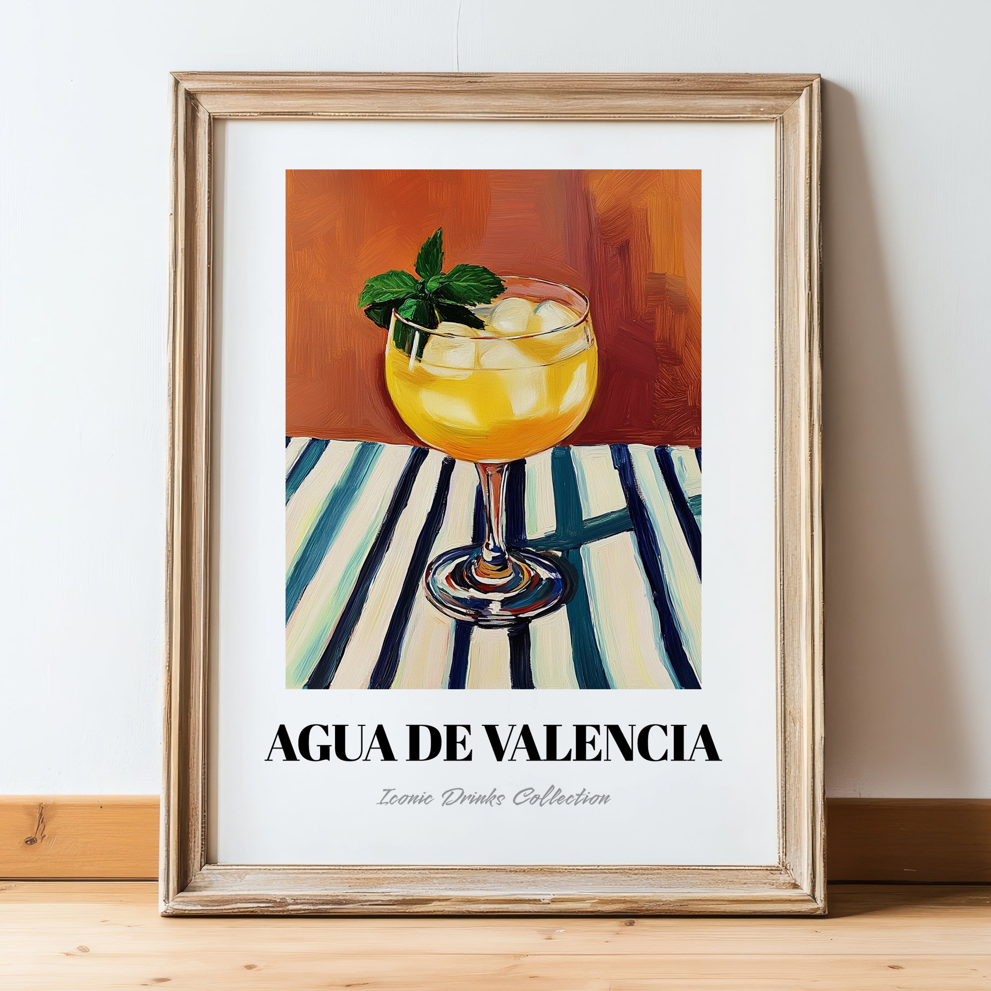 Agua De Valencia – on Striped Tablecloth, Spanish Cocktail Wall Art, in wooden frame leaning on the floor
