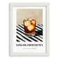 Long Island Iced – on Striped Tablecloth, American Cocktail Print, placed in minimal white frame