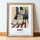 Korn – German Street Café Scene, German Spirit Wall Print, in wooden frame leaning on the floor