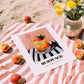 Rum Punch – on Striped Tablecloth, Jamaican Cocktail Wall Art, unframed on coastal sand