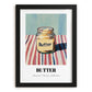 Butter – on Striped Tablecloth, Dry Goods Painting, in sleek black frame