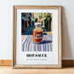 Hot Sauce – Italian Urban Café Scene, Bbq Print, in wooden frame leaning on the floor