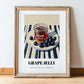 Grape Jelly – on Striped Tablecloth, Jam Art, in wooden frame leaning on the floor