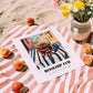 Rosehip Jam – Italian Urban Café Scene, Jam Illustration, unframed on coastal sand
