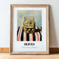 Olives – on Striped Tablecloth, Canned Vegetables Still Life, in wooden frame leaning on the floor