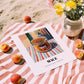 Mace – Italian Outdoor Café Scene, Spices Illustration, unframed on coastal sand