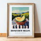 Honeydew Melon – Valley Café Scene, Fruit Illustration, in wooden frame leaning on the floor