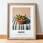 Olive – on Striped Tablecloth, Vegetable Wall Decor, in wooden frame leaning on the floor