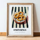 Onion Rings – on Striped Tablecloth, American Food Wall Art, in wooden frame leaning on the floor