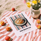 Sourdough – on Striped Tablecloth, American Food Still Life, unframed on coastal sand