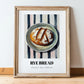 Rye Bread – on Striped Tablecloth, German Food Illustration, in wooden frame leaning on the floor