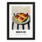 Brioche – on Striped Tablecloth, French Pastry Painting, in sleek black frame