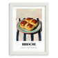 Brioche – on Striped Tablecloth, French Pastry Painting, placed in minimal white frame