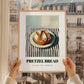 Pretzel Bread – on Striped Tablecloth, German Pastry Still Life, styled in a charming Paris street view