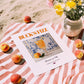Buck's Fizz – English Cocktail Drink, Rooftop Terrace Wall Art, unframed on coastal sand