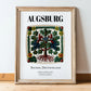Augsburg, Germany – Travel Poster, in wooden frame leaning on the floor