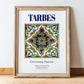 Tarbes, France – Travel Poster, in wooden frame leaning on the floor