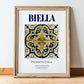 Biella, Italy – Travel Poster, in wooden frame leaning on the floor